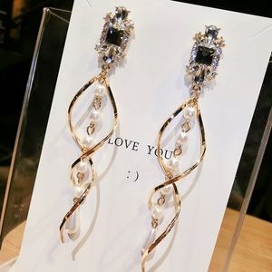 Flashy Dazzling and Dangling Swirl Earrings